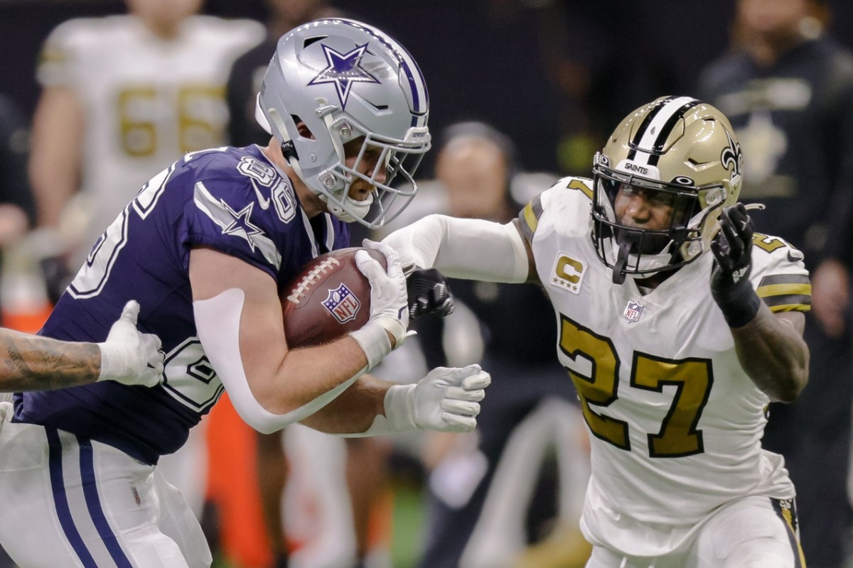 New Orleans Saints safety Malcolm Jenkins (27) tackles Dallas tight end Dalton Schultz (86). Mandatory Credit: Stephen Lew-USA TODAY Sports